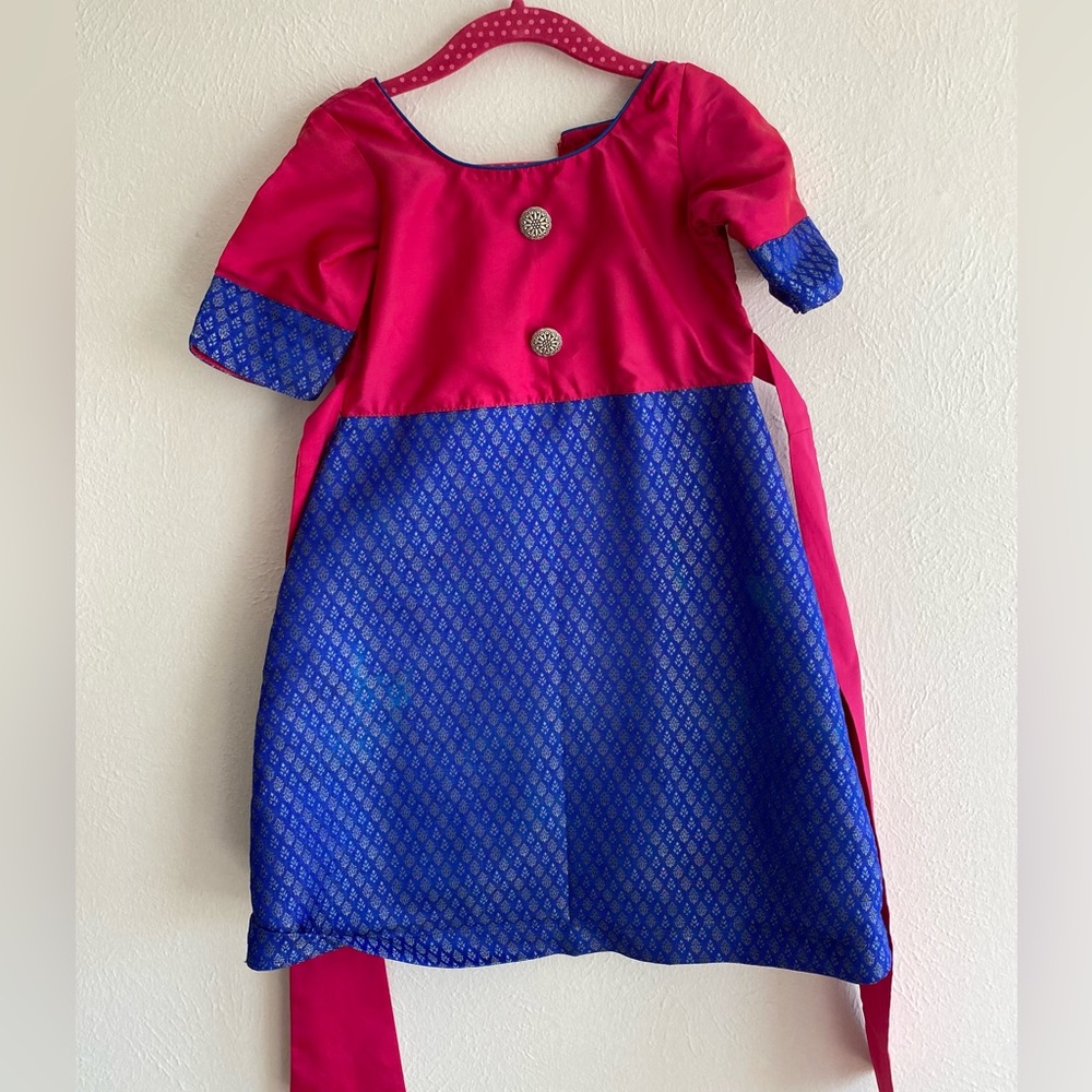 Pure silk and brocade. Hand wash only.